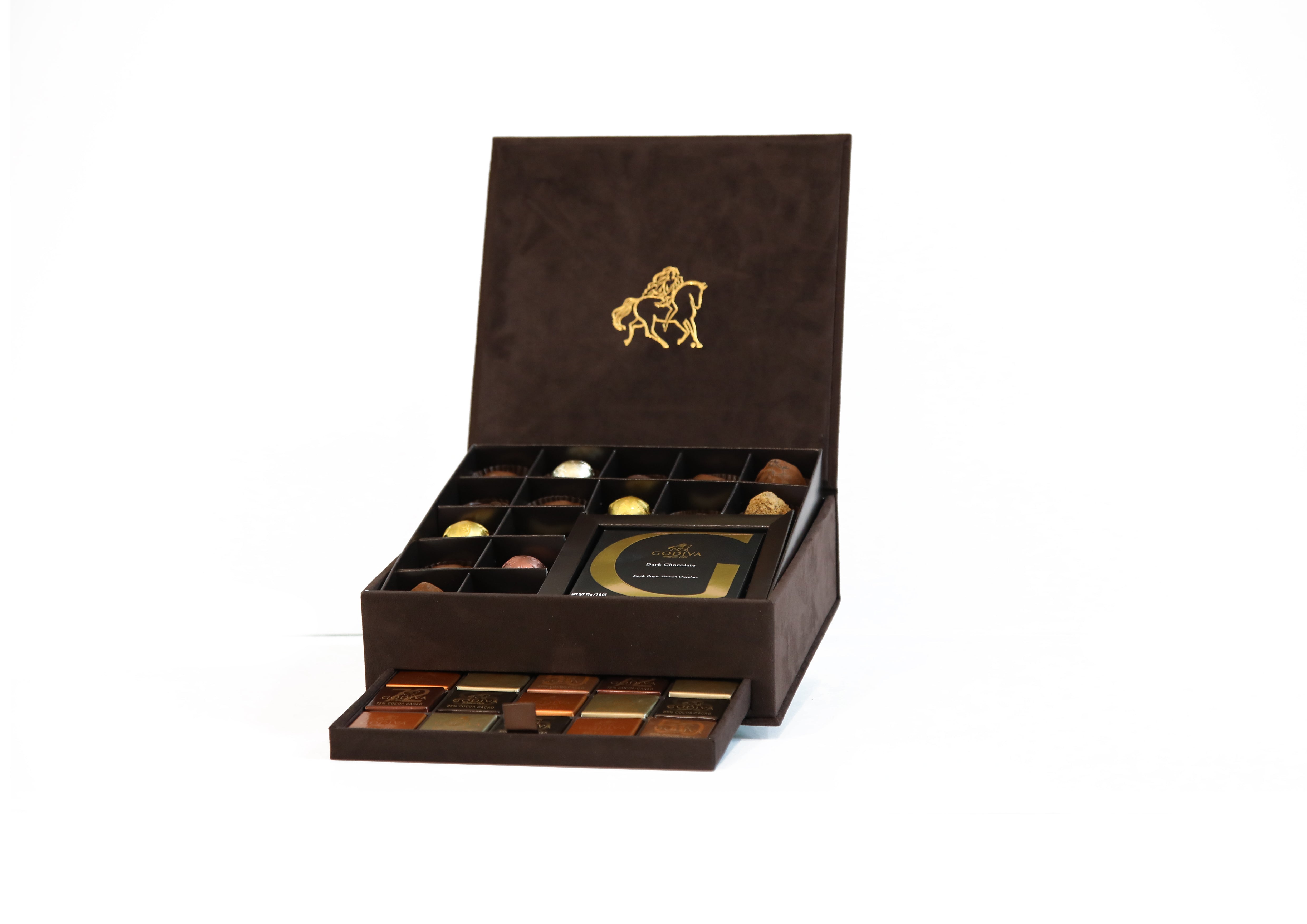 Godiva G - Royal CoffretChocolate & ConfectioneryThe finest of GODIVA's chocolates have been selected in these editions. The delicious recipes made with the finest ingredients reflect GODIVA's Chefs Chocolatier strong know-how. Discover smooth ganaches an