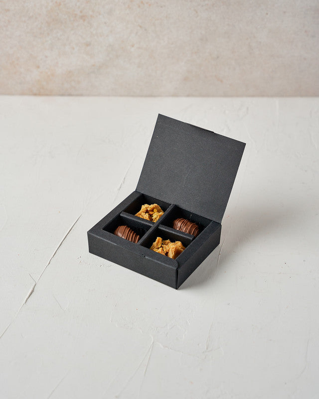 Small Dates and Baklawa BoxChocolate & ConfectioneryYour Gift Contains: • 2 Belgian Milk chocolate covered majdoul Dates • 2 pieces Pistachio Baklawa • Box Size: LxBxH: 10x8x2.3cm Handling and Storage • Keep away from direct heat and sunlight • Best store