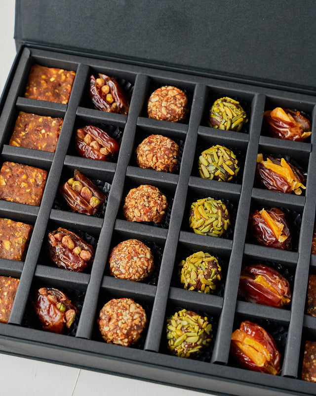 Sugarfree Desserts by NJDChocolate & ConfectioneryYour Gift Contains: • 5 Almond and Dates enegry Balls • 5 Pistachio and Dates enegry Balls • 5 Mango stuffed Majdoul dates • 5 Pistachio stuffed Majdoul dates • 10pcs Pistachio and Almond flavour Energy bi