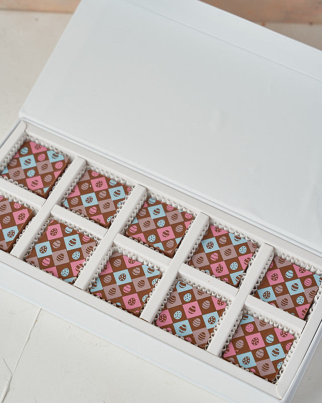 10 Easter Theme ChocolatesChocolate & ConfectioneryYour Gift Contains: • Belgian Milk chocolate in Easter theme • Flavor: Hazelnut and Biscoff • Weight of the chocolate: 180gms • Box Size: 12x28.5x4cm Handling and Storage • Keep away from direct heat and