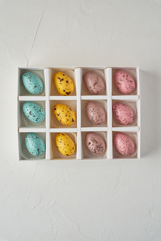 12 Spring Color Easter EggsChocolate & ConfectioneryYour Gift Contains: • 12 pieces Spring theme Belgian chocolate Easter Eggs • Weight: 300 grams approx. • Box Size: 24x18x3.5cm Handling and Storage • Keep away from direct heat and sunlight • Best stored