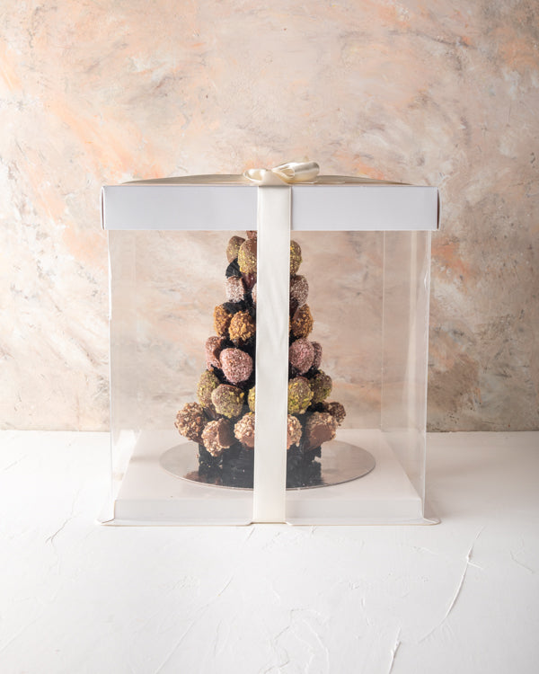 Assorted Chocolates Dates Arrangement by NJDSweetsYour Gift Contains: 47 chocolate covered dates in assorted flavors Almond Pistachio Coconut Lotus Box/Tray Size: LxBxH: 20x20x20cm HANDLING AND STORAGE Keep away from direct heat and sunlight Keep it refri