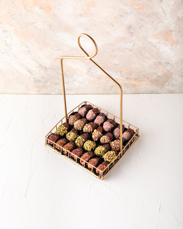 Dates Arrangement 24pcs by NJDNuts Dates & Dried FruitsYour Gift Contains: 24 pieces Chocolate covered dates in following flavors - Coconut flavors: 6 pieces - Roasted Almonds: 6 pieces -Roasted Pistachio: 6 pieces -Rose Flavor: 6 pieces Box/Tray Size: Lx