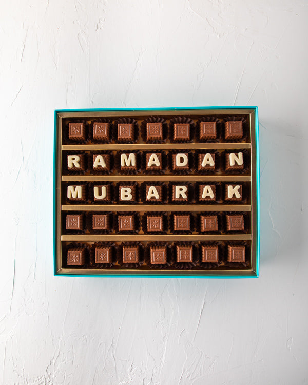 Ramadan Mubarak Customizable Box by NJDSweetsYOUR GIFT CONTAINS 35pieces of pure milk chocolate made with rich Belgian chocolate. Customize your Ramadan greetings and make them feel special. Box/Tray Size: LxBxH: 31x 25.5x6cm HANDLING AND STORAGE Keep awa