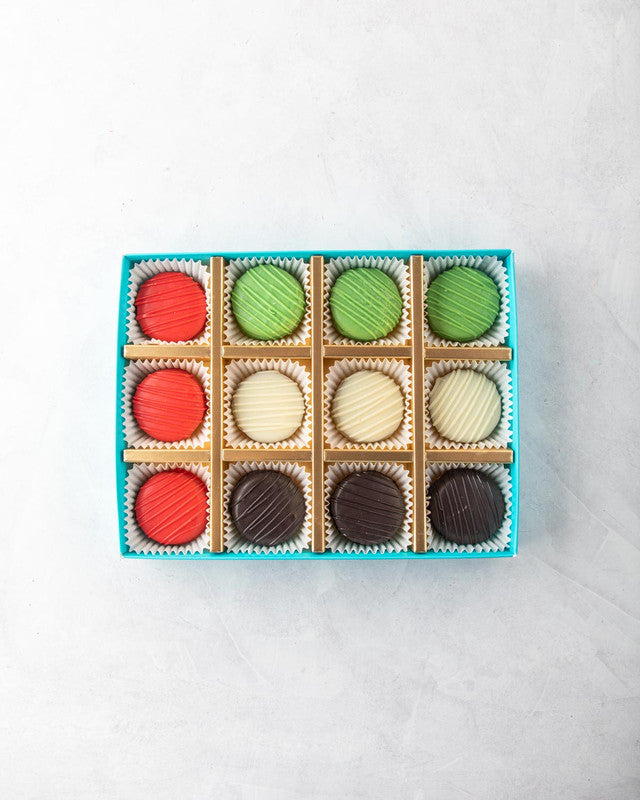 UAE Flag OreosSnacksYOUR GIFT CONTAINS Content: 12 Pcs of Chocolate Coated Oreos Flavors Chocolate Oreos white and Dark Chocolate Box dimensions: Wide: 24cm Height: 5cm HANDLING AND STORAGE Keep away from direct heat and sunlight All our products are made