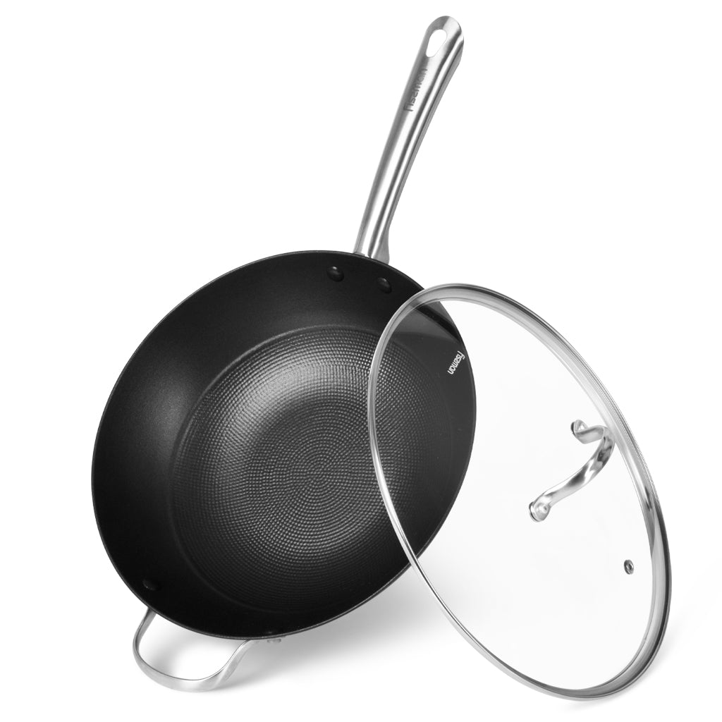 FISSMAN MELITA Wok Pan 30x8cm/4.2L with Glass Lid Lightweight Cast Iron with Non-Stick CoatingKitchen StorageMELITA Cook like a professional chef and impress your family and friends! Get our Frying pan to be more innovative with your cooking techniques an