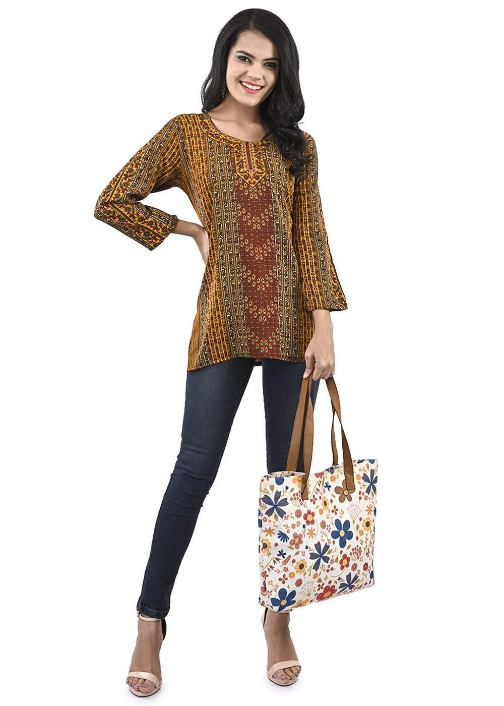 Women's Regular Maroon and Yellow and Printed Short KurtiFashionSmart modernity with traditional yet casual aspects characterize these Short Kurtis. The fashion-conscious woman reflects these kurtis with an easy going attitude with a blend of fashion and