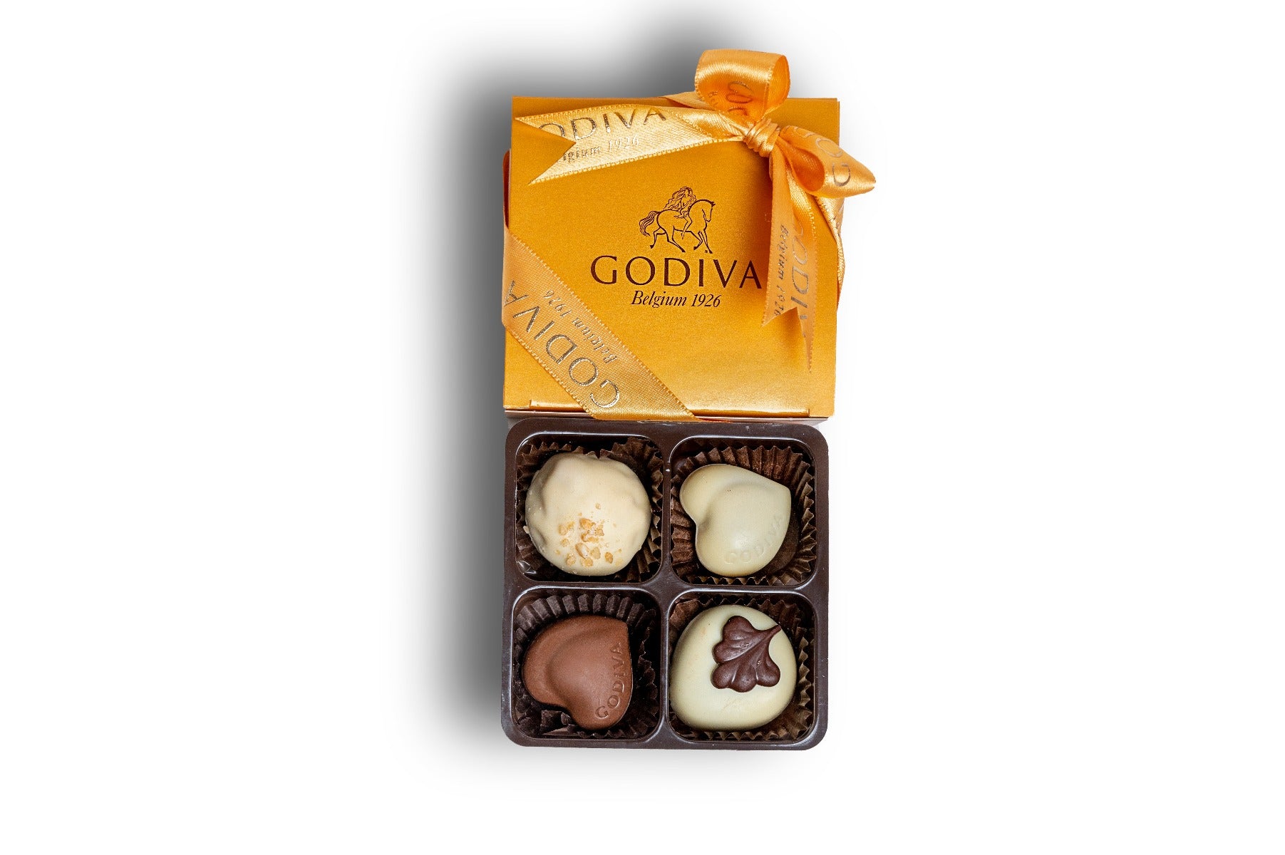 Godiva Ballotin - 4 PCSChocolate & ConfectioneryPresented in a luxuriously-crafted golden gift box featuring our most treasured chocolates, gold ballotins from GODIVA come ready to gift, serve, savor and share. These gold gift boxes are a luxurious chocol