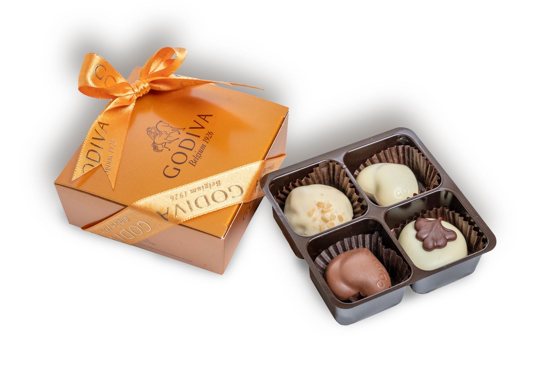 Godiva Ballotin - 4 PCSChocolate & ConfectioneryPresented in a luxuriously-crafted golden gift box featuring our most treasured chocolates, gold ballotins from GODIVA come ready to gift, serve, savor and share. These gold gift boxes are a luxurious chocol