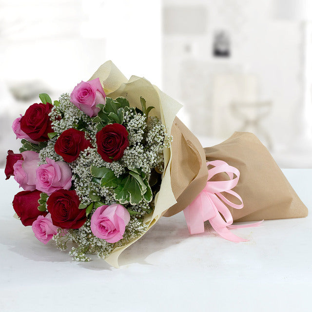 Stolen Kisses 12Flowers6 Pink Roses 6 Red Roses Fillers- 6 Pittosporum & 5 Gypsophila Wrapped with Off White & Light Brown Color Fabric