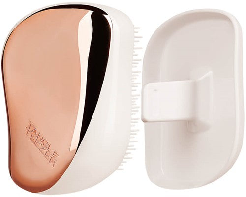 T.T Rose Gold / Ivery / CreamHair CareA handbag friendly design. - You can smooth shine and define anytime and anywhere thanks to its unique two tiered system technology. - The long teeth detangle and the short teeth smooth the hair cuticle for healthier