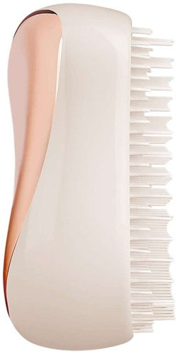 T.T Rose Gold / Ivery / CreamHair CareA handbag friendly design. - You can smooth shine and define anytime and anywhere thanks to its unique two tiered system technology. - The long teeth detangle and the short teeth smooth the hair cuticle for healthier